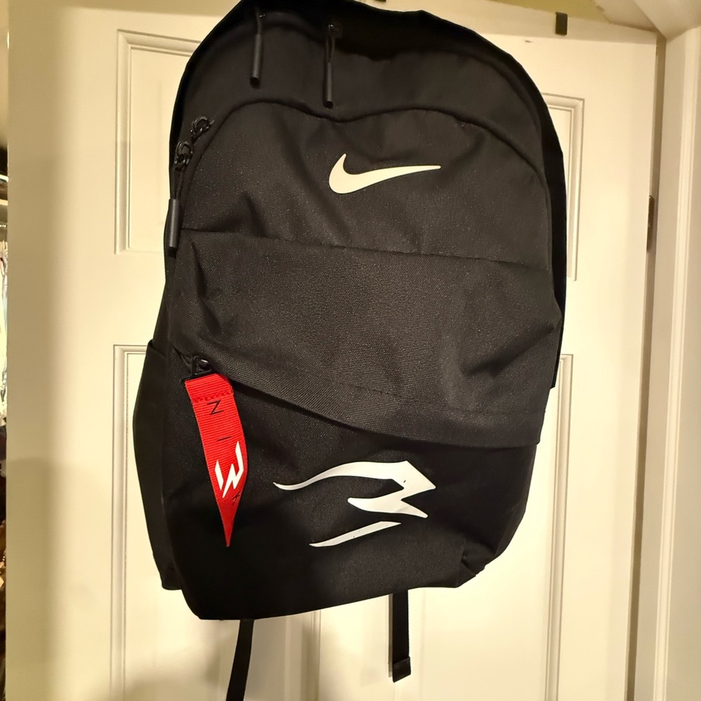 Nike Black Backpack with White Swooshes and Red Pull Tab
